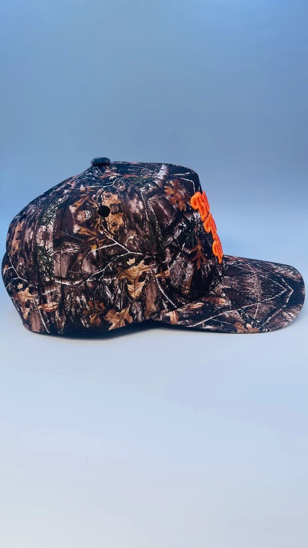 Buck Your Ideas Trucker Cap - Camo / Orange
